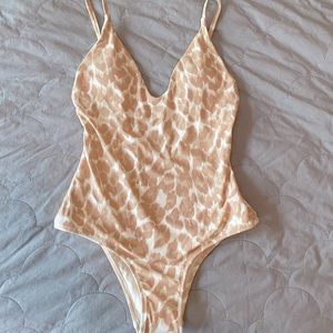 NWT one piece size xs